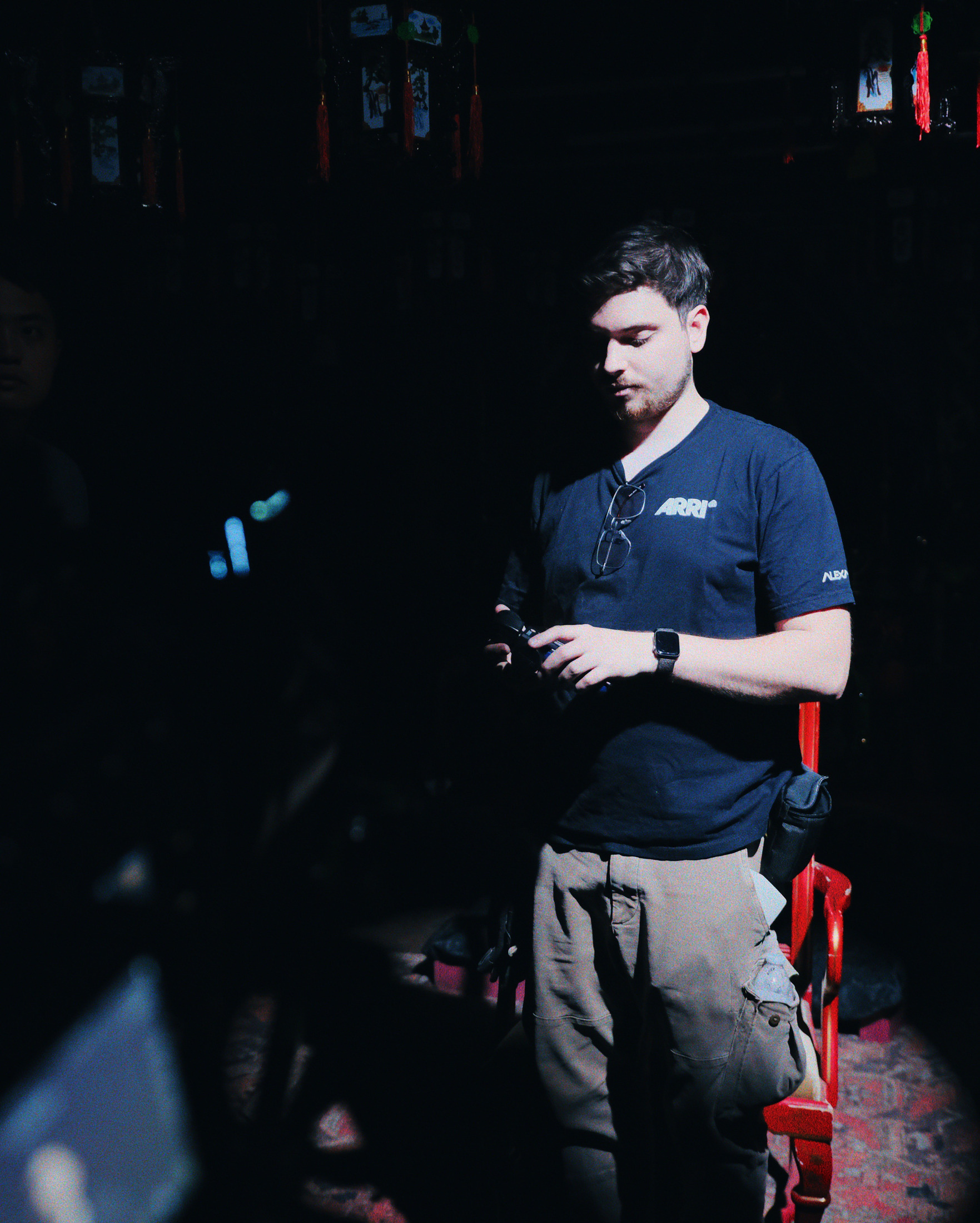 Nick Azzaro working with camera